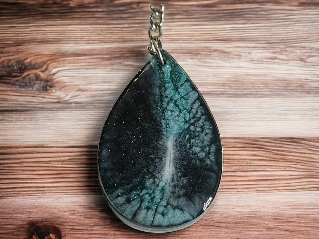 Green teardrop shaped keychain