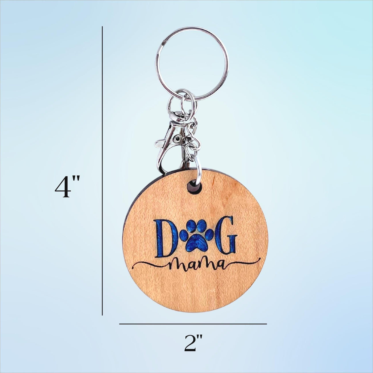 Size chart for keyring showing that it measures 2" across and 4" from top of keyring to bottom of wood disc.